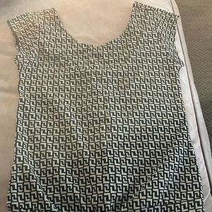 Short sleeve knit blouse with button detail down the back